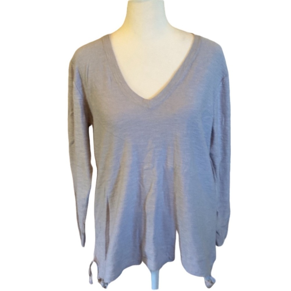 J. Crew Factory long sleeve top. Size M. Light blue. tassels at waist.